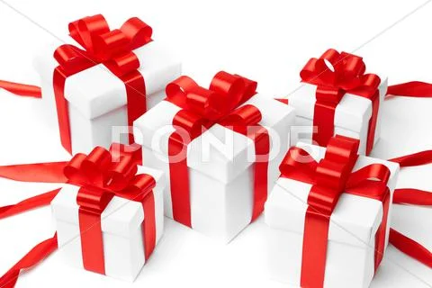 White gift box with red ribbon bow Stock Photos