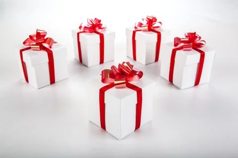 White gift boxes on gray Stock Photos