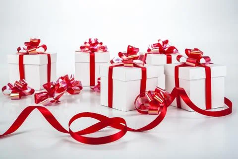 White gift boxes on gray Stock Photos