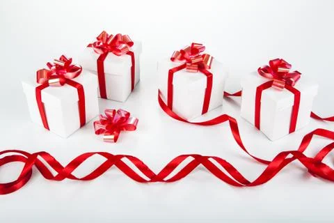 White gift boxes on gray Stock Photos