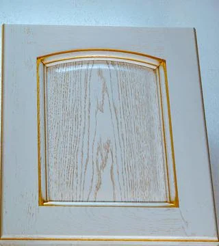 White gilded kitchen facade close up. wood textured decorative item backgroun Stock-Fotos