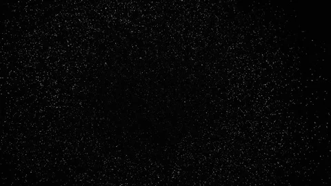 White glitter particles bursting and falling on dark background for festive Stock Footage 339074989