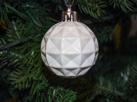 White globe in a Christmas tree Photos