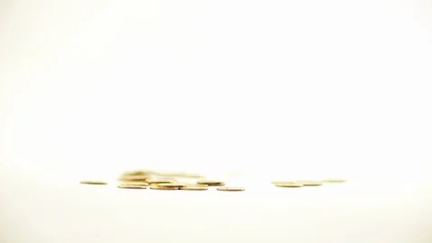 White-gloved hands scooping up a pile of gold coins. They sort out and scatter Stock Footage 122655639