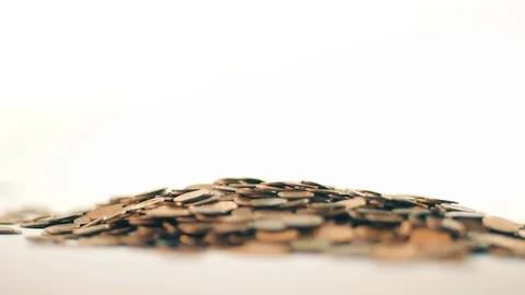 White-gloved hands scooping up a pile of gold coins. They sort out and scatter Stock Footage 122657683