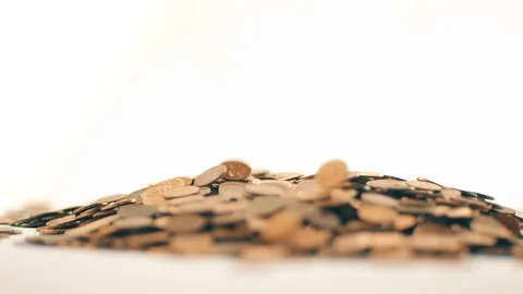 White-gloved hands scooping up a pile of gold coins. They sort out and scatter Stock Footage 122658227