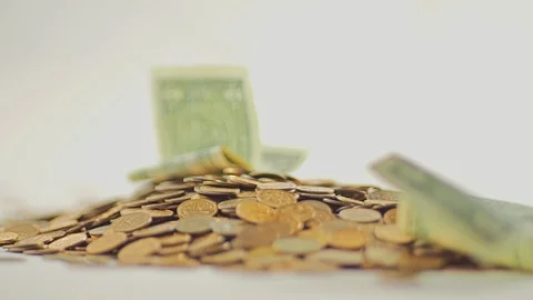 White-gloved hands scooping up a pile of gold coins. They sort out and scatter Stock Footage 122659527