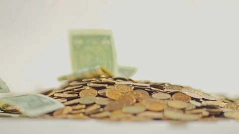 White-gloved hands scooping up a pile of gold coins. They sort out and scatter Stock Footage 122659730