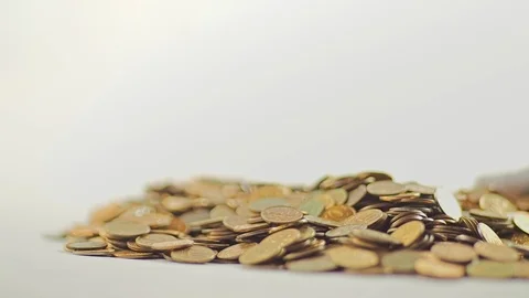 White-gloved hands scooping up a pile of gold coins. They sort out and scatter Stock Footage 122665023