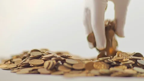 White-gloved hands scooping up a pile of gold coins. They sort out and scatter Stock Footage 122666745