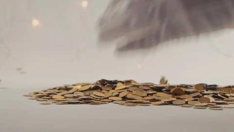White-gloved hands scooping up a pile of gold coins. They sort out and scatter Stock Footage 122673588