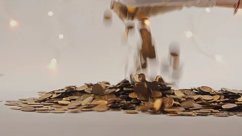 White-gloved hands scooping up a pile of gold coins. They sort out and scatter Stock Footage 122677449