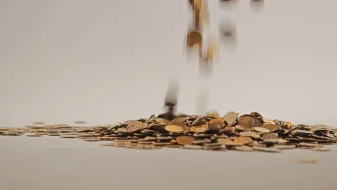 White-gloved hands scooping up a pile of gold coins. They sort out and scatter Stock Footage 122705085