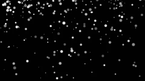 White glowing falling blurred snowflakes isolated on black background in winter Stock Footage 220828183