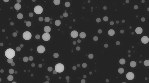 White glowing spheres dancing with ease on a black background 스톡 동영상 63151971