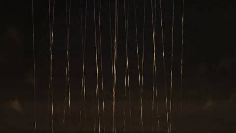 White glowing threads stretching from top to bottom on a black background. Video stock 317879661