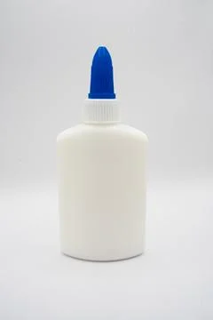 White Glue Bottle with Blue Cap on White Background Stock Photos