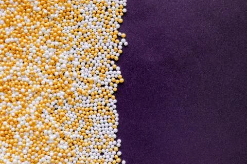 White, Gold, Shiny and Tiny Sugar Balls Background Stock Photos