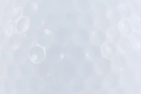 White golf ball macro backround Stock Photos
