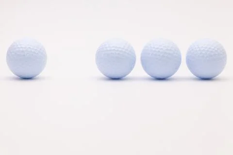 White golf balls on the white background. 스톡 사진