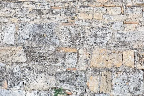 White gray surface texture of an old stone wall in Hierapolis city, Turkey. Stock Photos