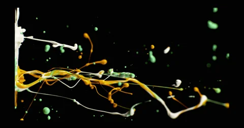 White, green &amp; mustard paint in motion in 4K Stock Footage 59921328