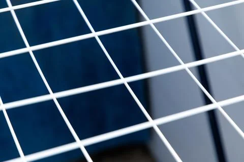 White grid lines overlay a deep blue surface Stock Photos