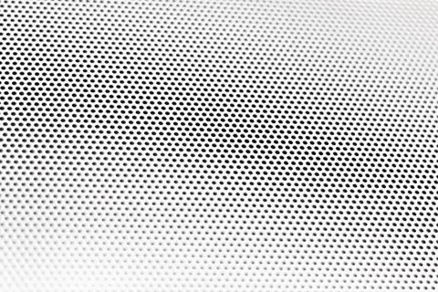 White grill with little circular pattern on degraded diagonal focus Stock Photos