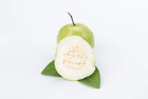 White guava slice with leaf isolated on white Stock Photos
