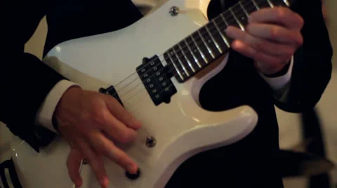 White Guitar Playing CU Video stock 26830198