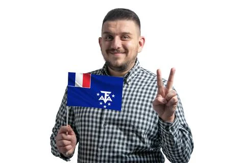 White guy holding a flag of French Southern and Antarctic Territories and sho Stock Photos