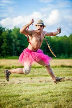 White guy with wings on his back. He displays bow with arrow. Cupid on Valent Stock Photos