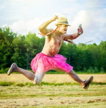 White guy with wings on his back. He displays bow with arrow. Cupid on Valent Stock Photos
