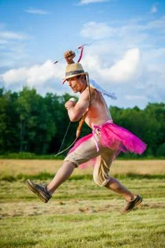 White guy with wings on his back. He displays bow with arrow. Cupid on Valent Stock Photos