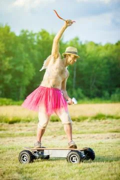 White guy with wings on his back. He displays bow with arrow. Cupid on Valent Stock Photos