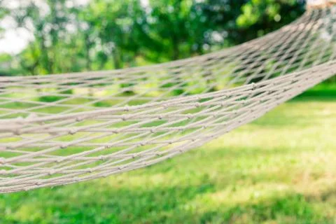 White hammock among the trees Stock Photos