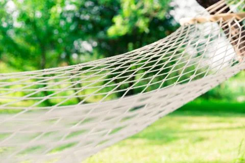 White hammock among the trees Stock Photos