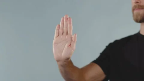 White hand and black hand are given the five stop racism all people are equal Stock Footage 133640313