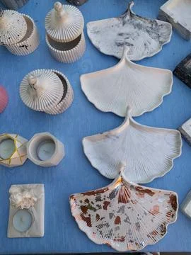 White handmade plaster plates shaped like ginkgo biloba leaves Stock Photos