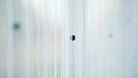 White hanging curtains made of thread with black elements. Video stock 172981753