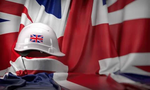 White hard hat laying over UK  flag. Construction and employment in United  K Stock Illustration