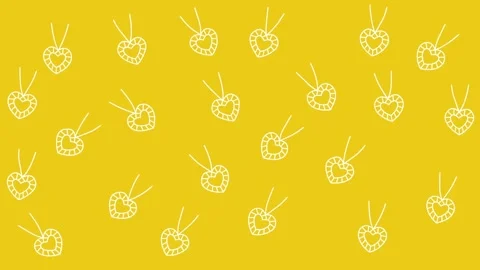 White Heart Pendant Pattern on Yellow Background Stock Footage 344875423