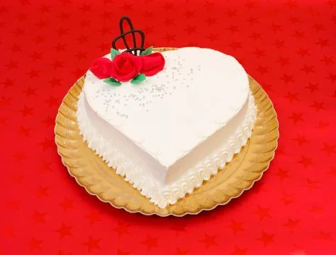 White heart shape cake Stock Photos