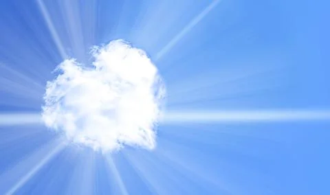White heart shaped cloud on blue sky,through which the rays of the sun break Stock Photos