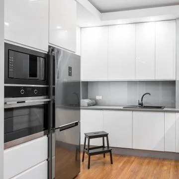 White high-gloss kitchen Stock Photos
