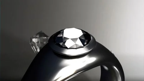 White highlight appearing, camera pulling back and tilting, ring revealing Stock Footage 339448676