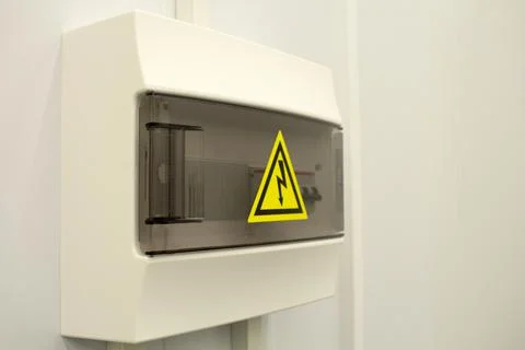 White Hinged Power Supply Box on the Wall Stock Photos