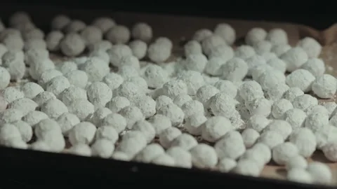 White home made round candy on a cookie sheet Stock Footage 294625869
