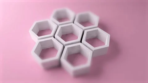 White honeycomb objects on pastel pink background with camera movement looped Stock Footage 144756915