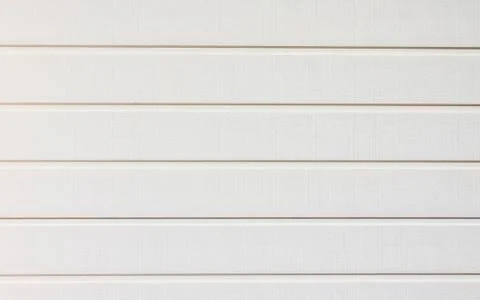 White horizontal siding panel for the background. Stock Photos